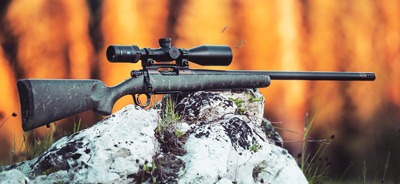 Christensen Arms Ridgeline rifle with carbon fiber barrel in alpine terrain