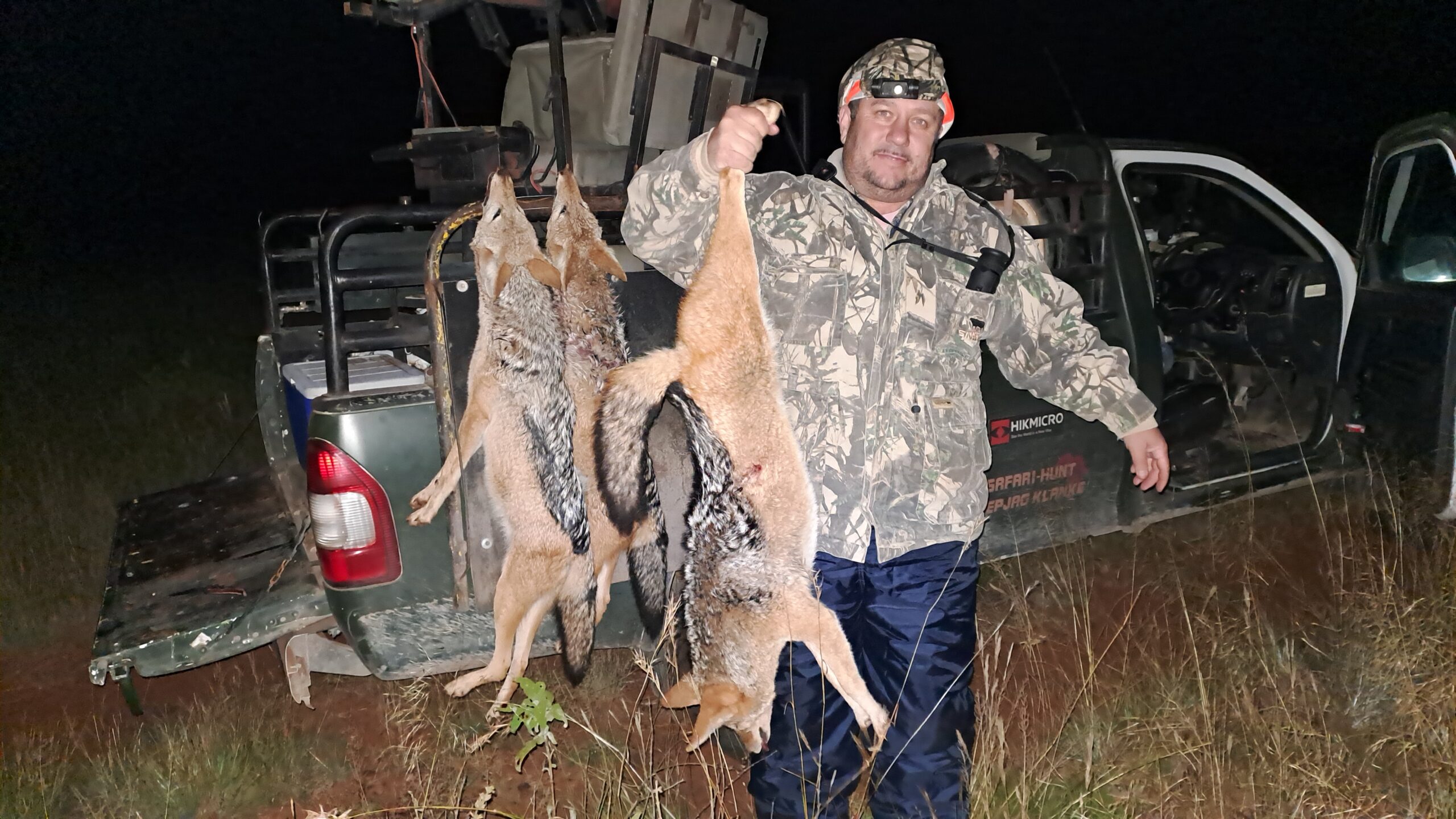 FOXPRO Shockwave electronic predator call set up in a desert field at dusk