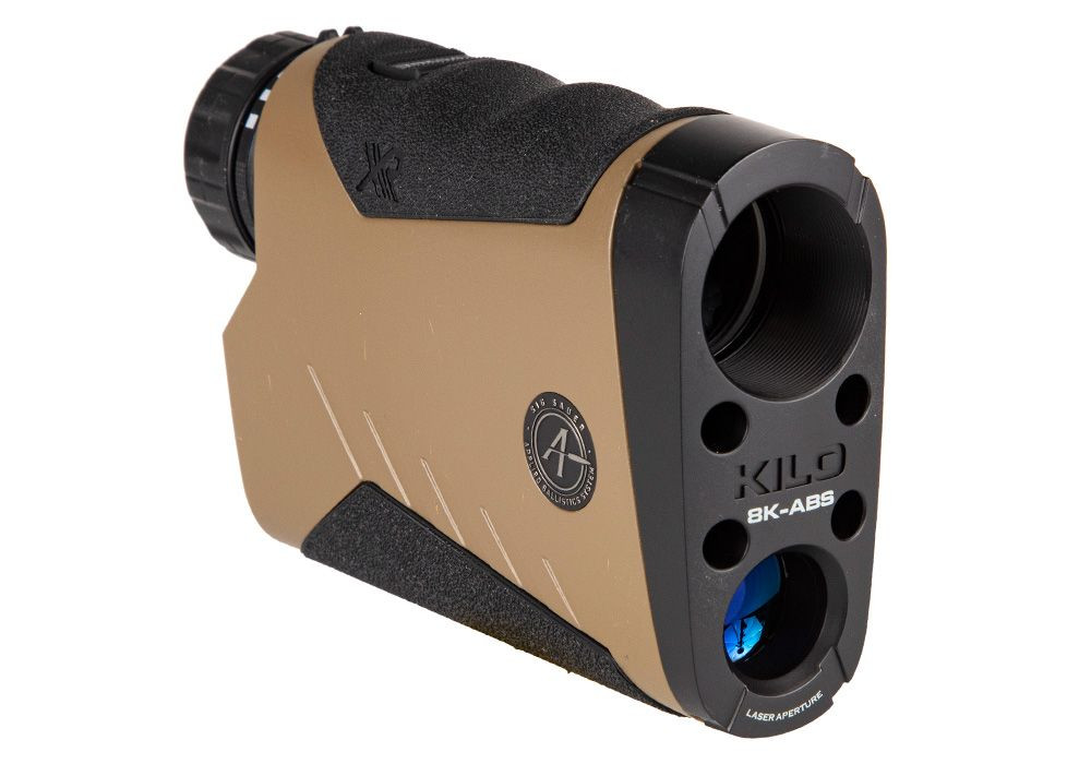 Sig Sauer KILO 3000BDX rangefinder held up against an open mountain landscape