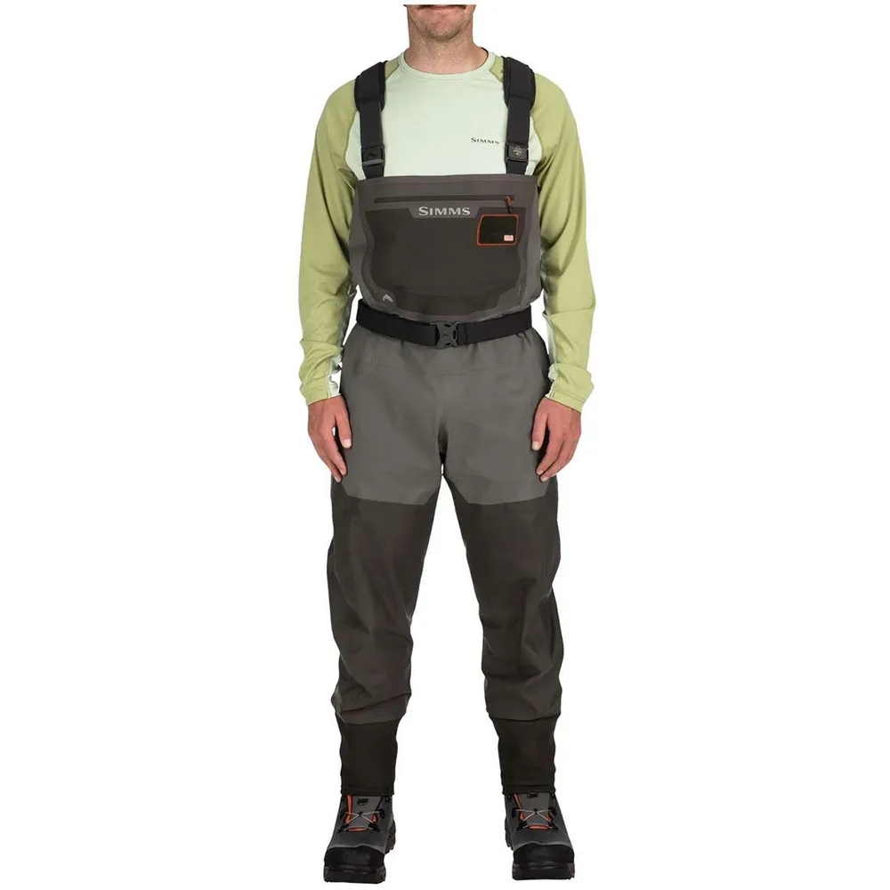 Simms G3 Guide waders hanging to dry on a log near a Pacific Northwest river