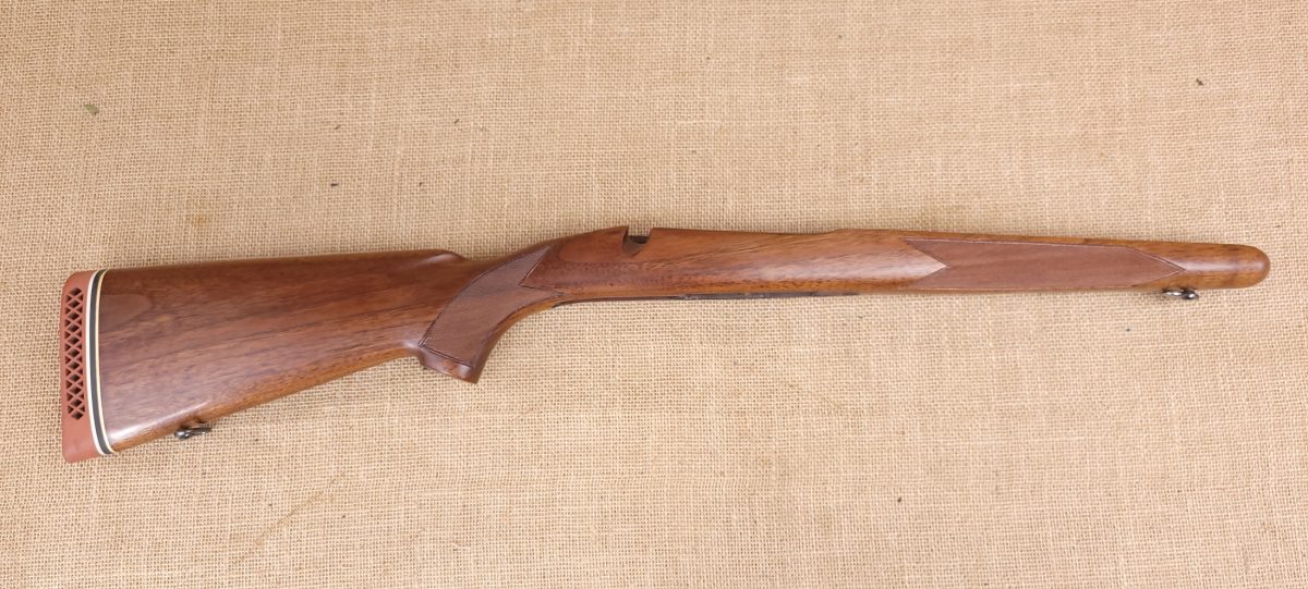 Winchester Model 70 rifle with classic walnut stock